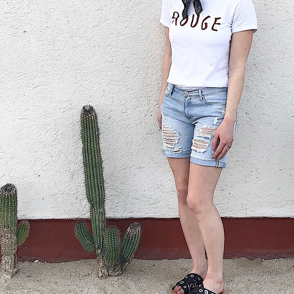 Distressed light washed articles of society shorts